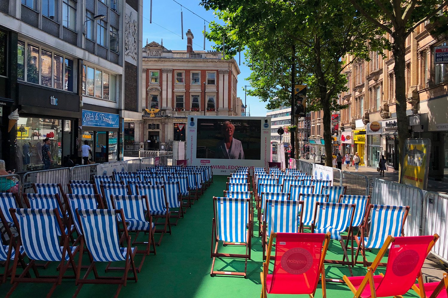 Colourful deckchairs creating a welcoming shared space in a town centre